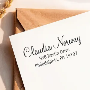 Personalized name and mailing address printed with a custom Address Stamp on white cardstock